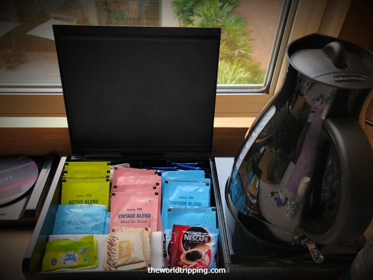 Electric Kettle with Tea & Coffee supplies in a room